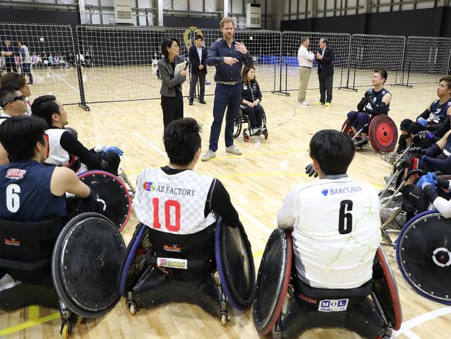 Britain’s Prince Harry speaks to athletes during his tour of the Japan Foundation's Para Arena in Tokyo. Picture: AFP