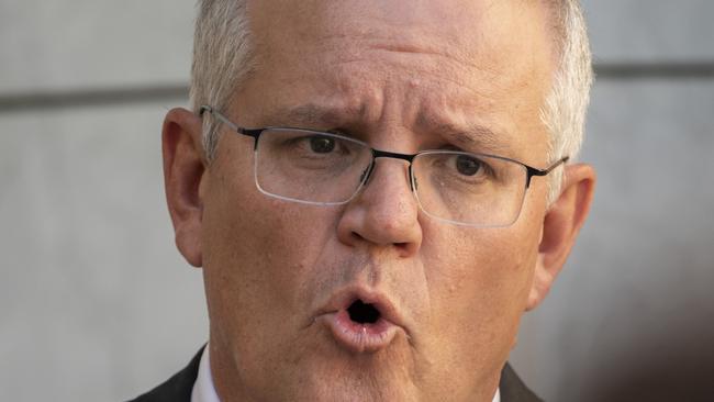 Prime Minister Scott Morrison said using the COVIDSafe app was like wearing sunscreen. Picture: NCA NewsWire / Martin Ollman