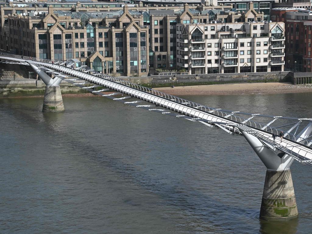 The normally busy Millennium footbridge across the Thames in London is deserted. Picture: AFP