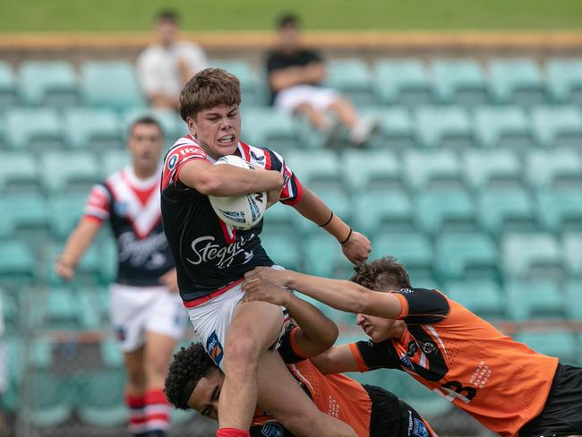 Eddy Cayless tries to break through. Picture: Julian Andrews