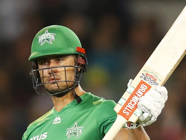 MELBOURNE, AUSTRALIA - JANUARY 04: Marcus Stoinis of the Stars raises his bat after making fifty runs during the Big Bash League match between the Melbourne Stars and the Melbourne Renegades at the Melbourne Cricket Ground on January 04, 2020 in Melbourne, Australia. (Photo by Daniel Pockett/Getty Images)