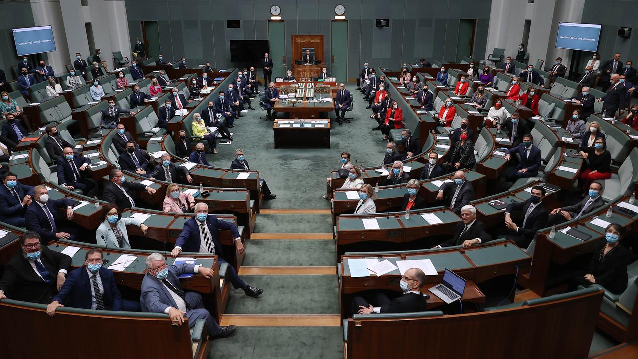 The parties takes their seats in the House of Representatives, with the government’s Liberal and National members to the left and Labor members opposite on the right, while independents sit at the curved end of the chamber. Picture: Gary Ramage