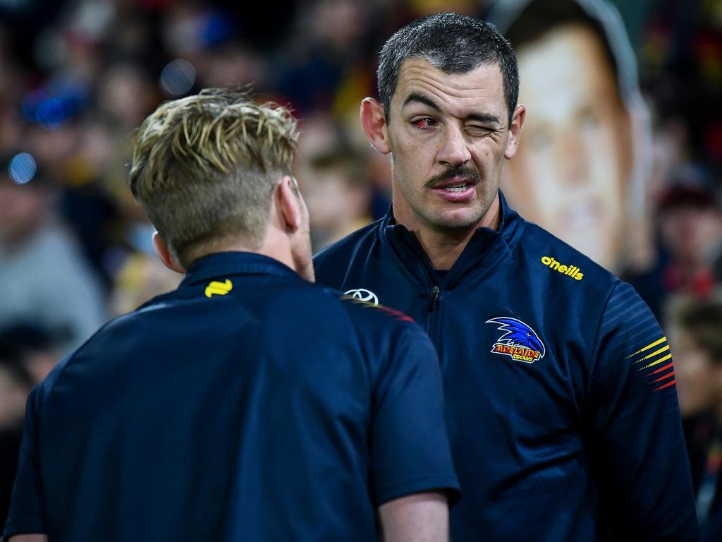 Rory Sloane checks out Taylor Walker’s eye after Sunday’s win. Picture: Mark Brake/Getty Images