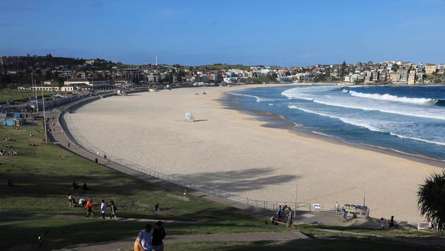 An empty Bondi Beach the day it was closed to crowds amid the COVID-19 pandemic. Picture: Damian Shaw