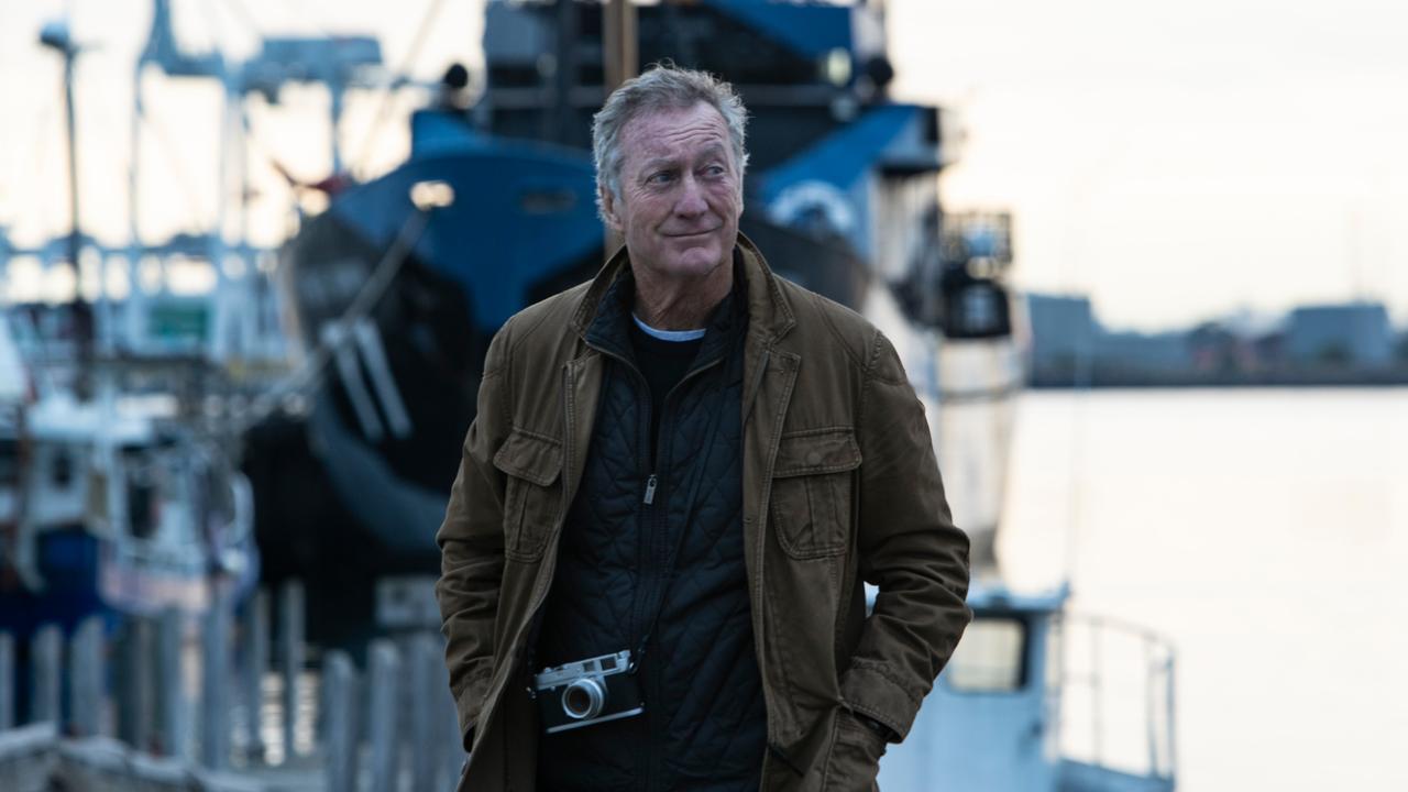 Bryan Brown plays war photographer Neil Stockton