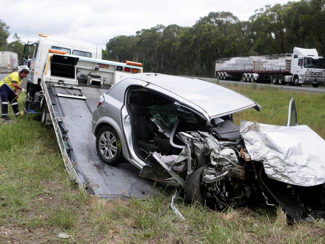 The remnants of the silver sedan which appeared to take off before hitting the car containing the mother and her two children on the Hume Highway. Picture: Ian Svegovic