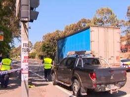 A woman was hit by a truck after its driver allegedly ran a red light on Monday. Picture: 7 News