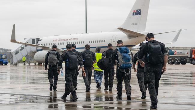 Australian Federal Police Special Operations members depart Canberra en route to the Solomon Islands capital of Honiara.