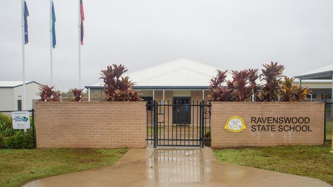 The old principal's residence and school buildings along with the new school building at Ravenswood State School.