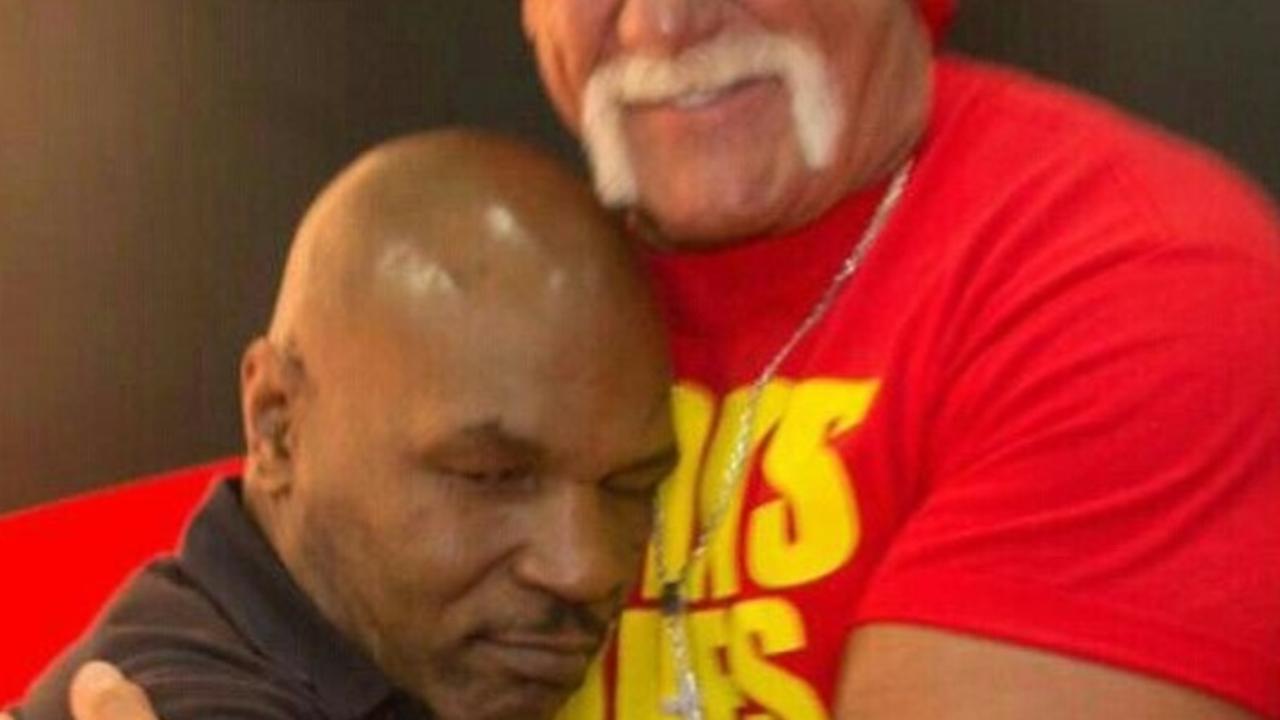 Hulk Hogan has shared a sweet throwback shot of him hugging Mike Tyson.