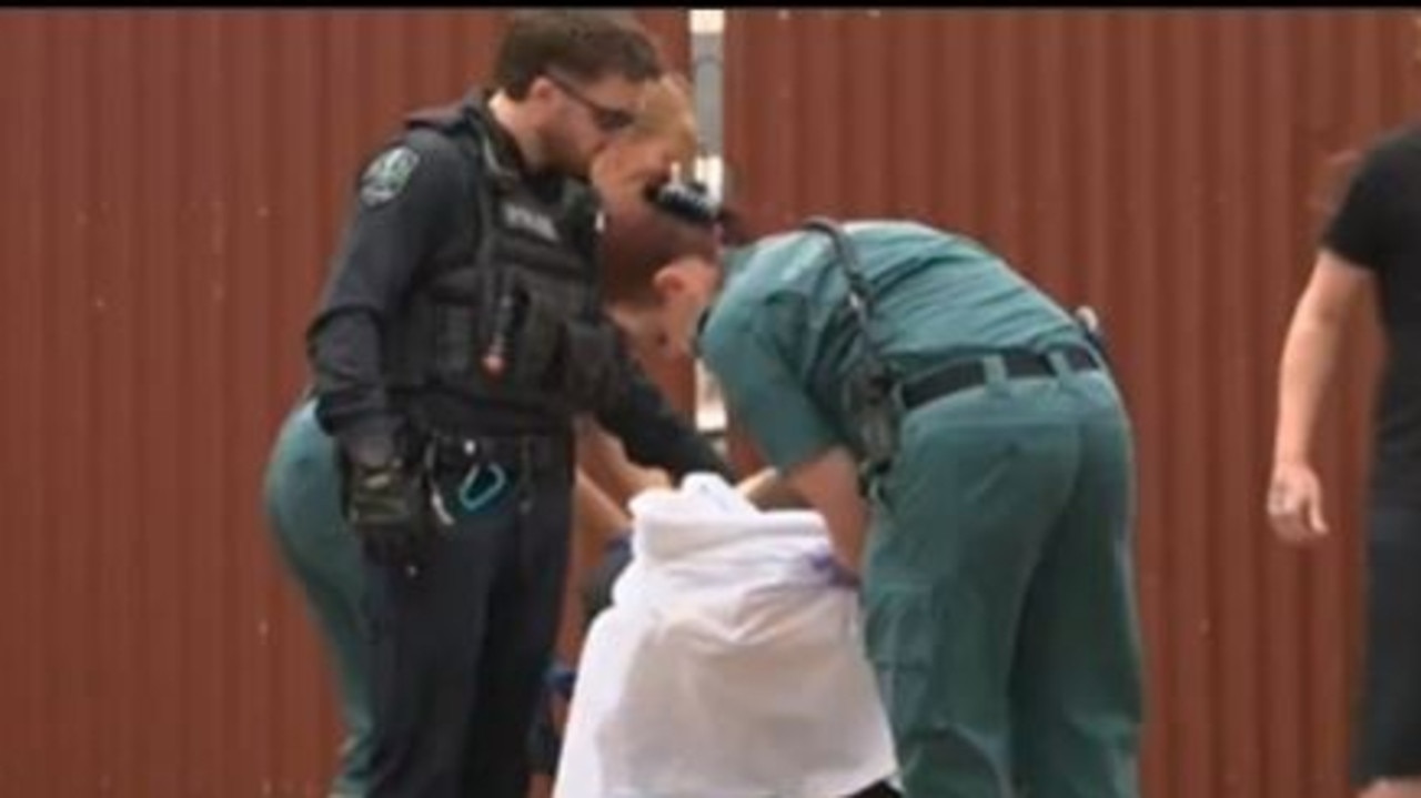 Scenes of utter chaos at Elizabeth south, a fight in a suburban street seeing machetes drawn then two people, mowed down by a car in their own front yard Picture: 7NEWS