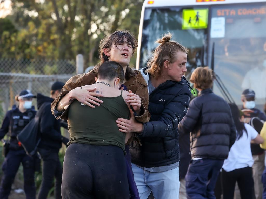 Protesters attempt to blockade a bus with refugees leaving the Broadmeadows detention centre. Picture: NCA NewsWire / Ian Currie