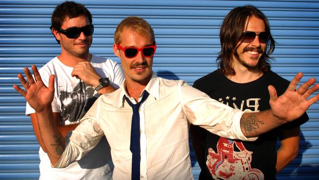 Silverchair members Chris Joannou, Johns and Ben Gillies in 2009.