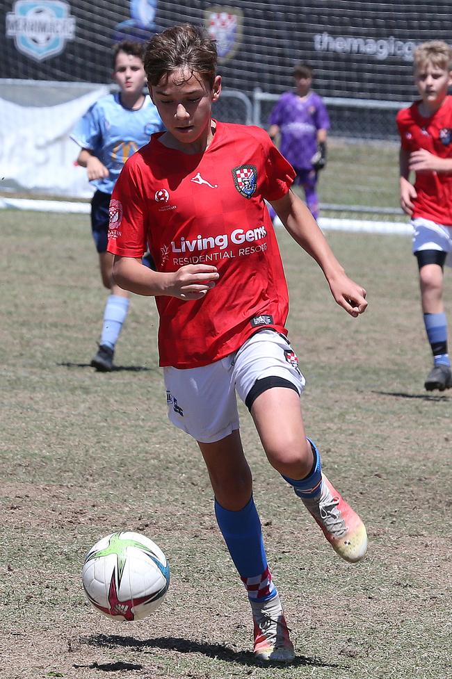The Premier Invitational football tournament on the Gold Coast. Gold Coast Knights Red v Springfield United under-13s in action. Picture: Mike Batterham.