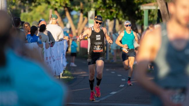 A finisher putting up the deuces after finishing. Picture: Pema Tamang Pakhrin.