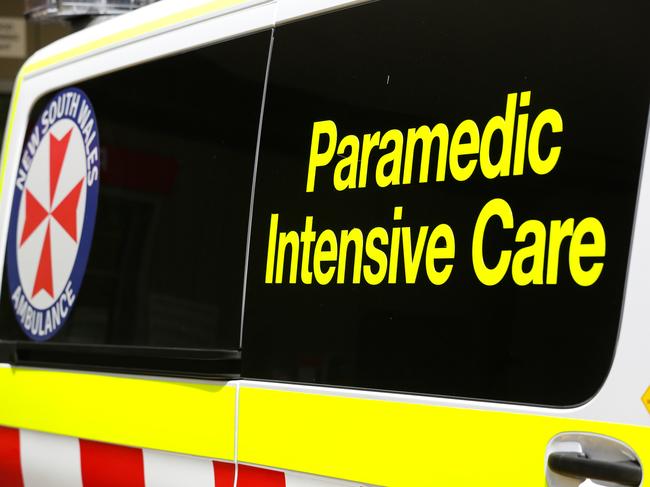 NSW Ambulance paramedics were called to the scene of a collision after a police pursuit on the northern beaches early on Friday. Picture: NCA Newswire / Gaye Gerard