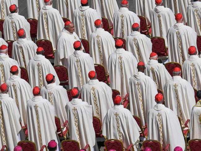Cardinals attend a holy mass a day after the funeral of Pope Francis, at St Peter's square in The Vatican, on April 27, 2025. (Photo by Damien MEYER / AFP)