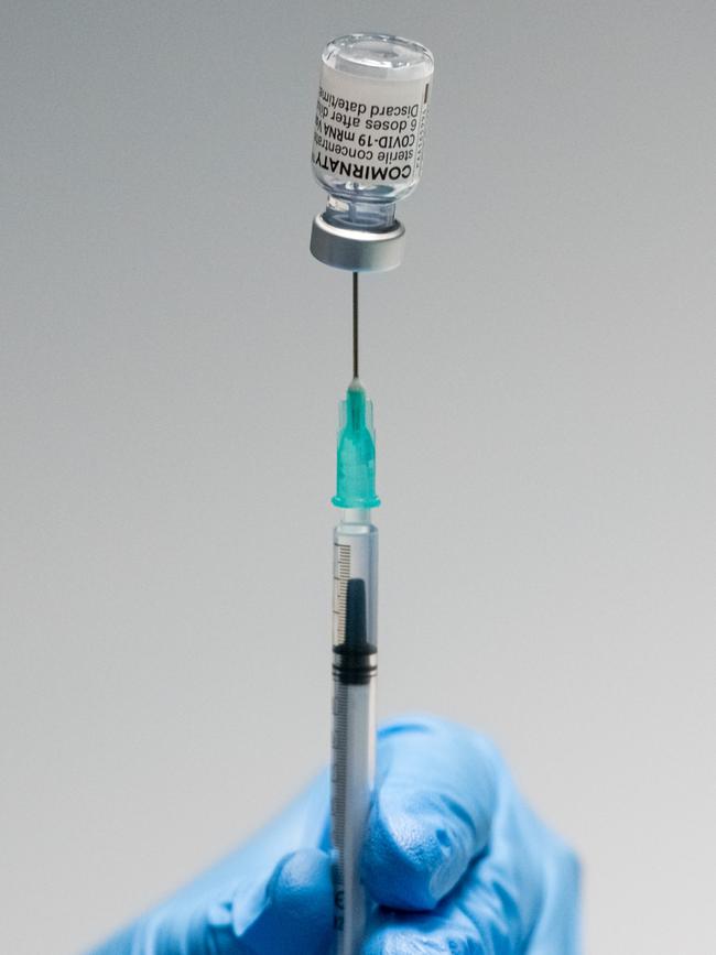 Medical staff prepares syringes that contain the Pfizer/BioNTech vaccine. Picture: Getty Images.