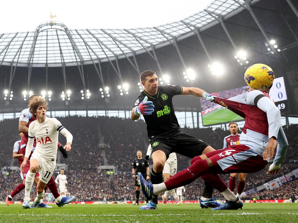 Emiliano Martinez of Aston Villa holds onto Ezri Konsa during a match against Tottenham Hotspur. Picture: Julian Finney/Getty Images