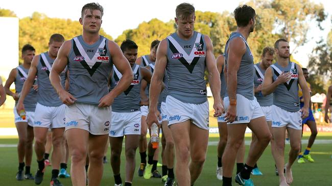 Port Adelaide players leave the ground after Sunday’s loss. Picture: Getty Images