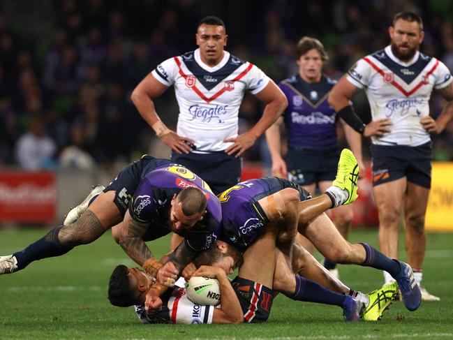 Nelson Asofa-Solomona applies pressure to the neck of Joseph Suaalii.