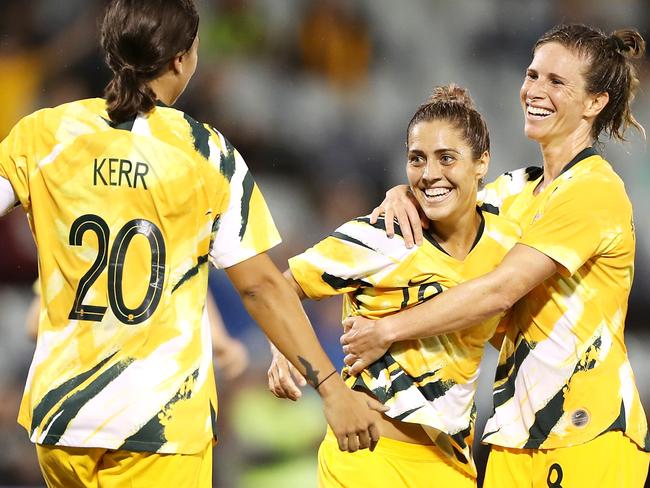 SYDNEY, AUSTRALIA - FEBRUARY 07: Katrina Gorry of the Matildas celebrates with her team mates Sam Kerr and Elise Kellond-Knight  of the Matildas after scoring a goal during the Women's Olympic Football Tournament Qualifier match between the Australian Matildas and Chinese Taiepi at Campbelltown Sports Stadium on February 07, 2020 in Sydney, Australia. (Photo by Mark Kolbe/Getty Images)