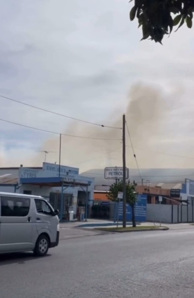 Thick smoke is visible across the northern suburbs after a fire erupted on Dyson St in Reservoir, burning through three homes on Wednesday morning. Picture: supplied/Facebook.