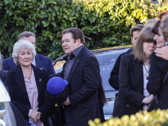 John Blackman Funeral. Daryl Somers holds the puppet Dickie Knee which Blackman was famous for on the show Hey Hey ItÃs Saturday. Picture: Ian Currie