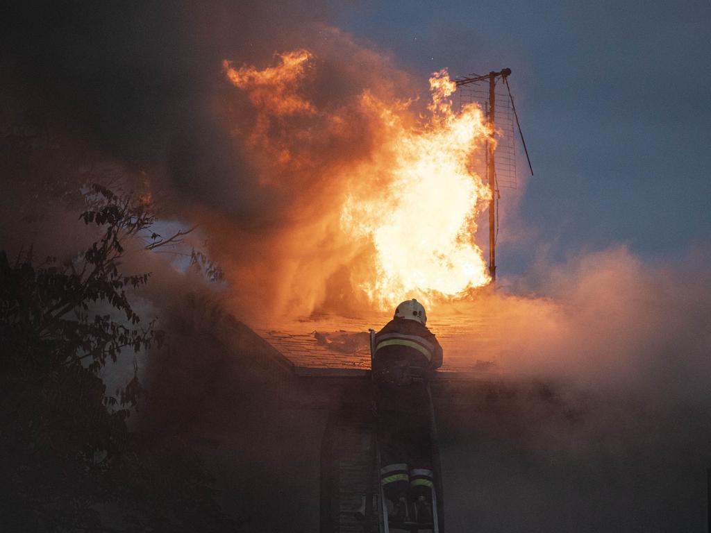 Firefighters extinguish a blaze after a Russian air strike hit a house in Kharkiv, Ukraine. Picture: Metin Aktas/Anadolu Agency via Getty Images