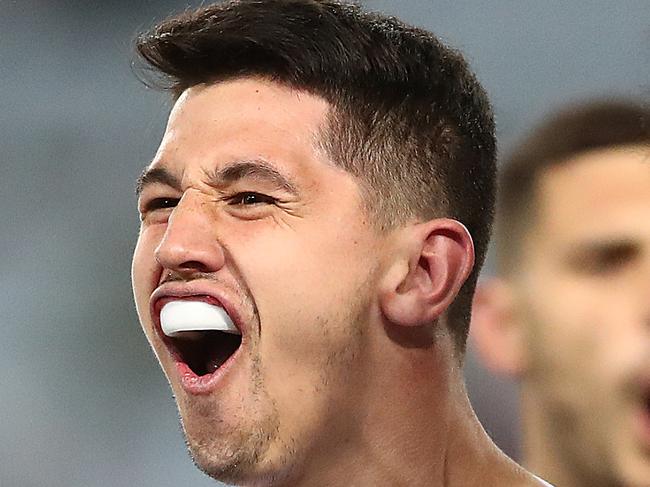 SYDNEY, AUSTRALIA - AUGUST 10: Jeremy Marshall-King of the Bulldogs celebrates scoring a try with team mates during the round 21 NRL match between the Canterbury Bulldogs and the Wests Tigers at ANZ Stadium on August 10, 2019 in Sydney, Australia. (Photo by Mark Metcalfe/Getty Images)