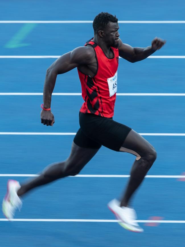 Adoulie Asim on his way to a big win in the 200m.