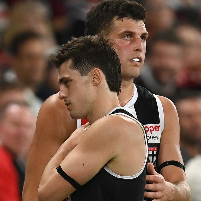 Jack Steele grabs at his injured shoulder.