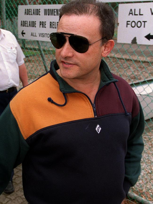 NCA bombing suspect Domenic Perre leaves the Adelaide Pre-Release Centre in 2001, after being jailed over a meth lab in 1997.