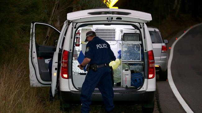 Police investigators at the scene of Mark Easter’s murder. Picture: Troy Snook