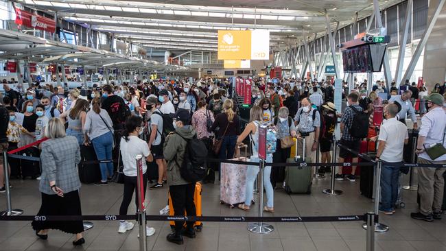 Queues of passengers at Kingsford Smith Airport, Sydney Picture: Julian Andrews.