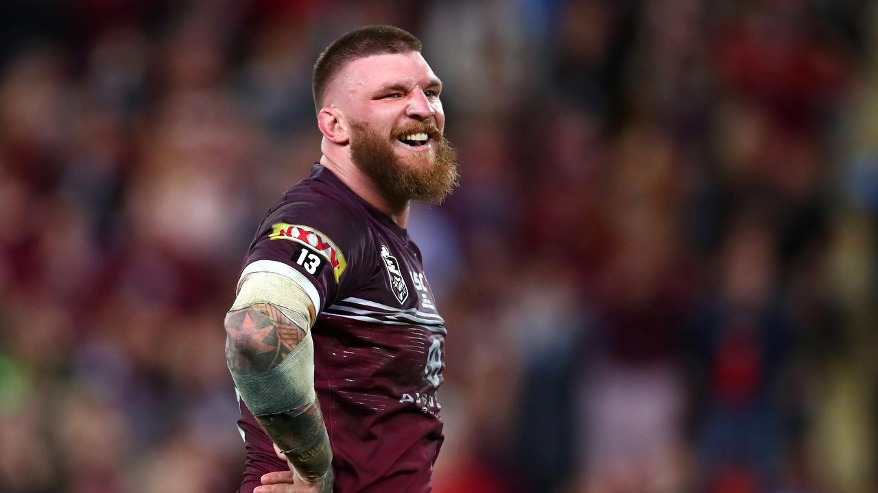 Players from the Broncos and Eels scuffle as Josh McGuire of the