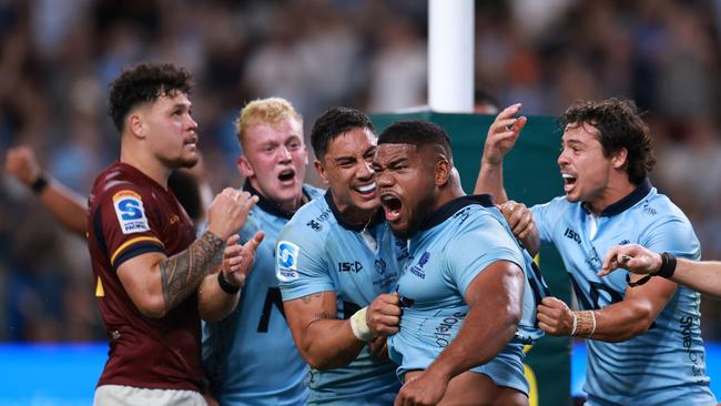 SYDNEY, AUSTRALIA - FEBRUARY 14: Siosifa Amone of the Waratahs celebrates the match winning try during the round one Super Rugby Pacific match between NSW Waratahs and Highlanders at Allianz Stadium, on February 14, 2025, in Sydney, Australia. (Photo by Darrian Traynor/Getty Images)