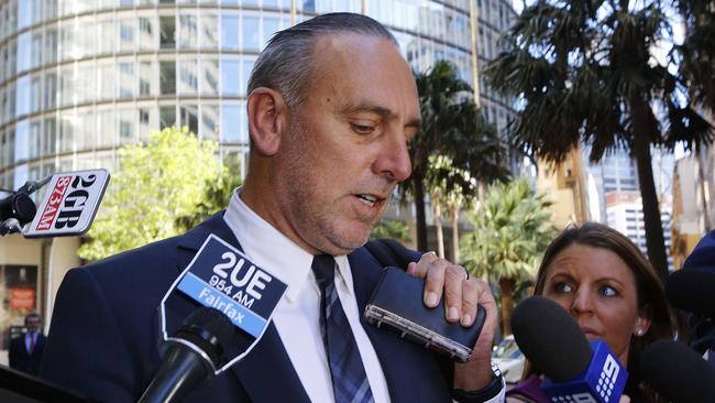 “What we didn’t do is report it to police.” Brian Houston, son of Hillsong founder Frank Houston, is surrounded by media following his 2014 appearance at a Royal Commission into child abuse. Picture: David Moir