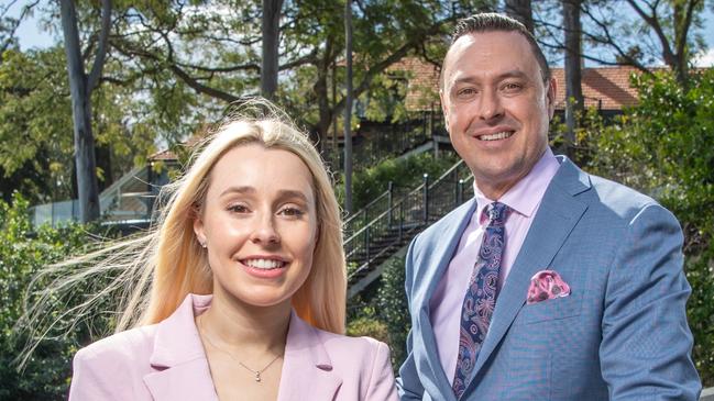 30-07-2021 CAREERS COVER Real estate agent Jason Adcock and his latest hire, Charlotte Agace, who got the job because she bothered to pick up the phone. Pictured at a property they have just sold in Graceville, Brisbane. PICTURE: Brad Fleet