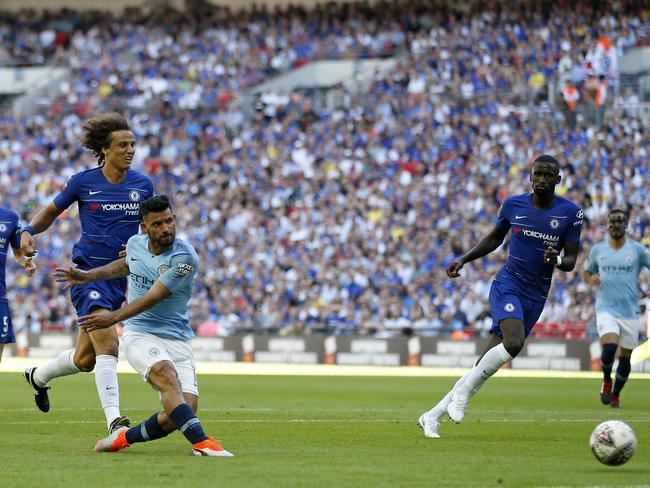 Manchester City's Argentinian striker Sergio Aguero (3rd L) shoots to score their second goal during the English FA Community Shield football match between Chelsea and Manchester City at Wembley Stadium in north London on August 5, 2018. / AFP PHOTO / Ian KINGTON / NOT FOR MARKETING OR ADVERTISING USE / RESTRICTED TO EDITORIAL USE