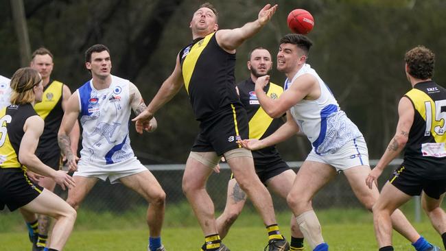 SFNL: South Mornington’s Jake Straughair stretches for the ball. Picture: Valeriu Campan