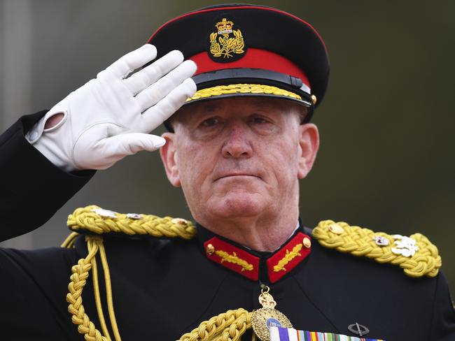 Australian Governor-General Sir Peter Cosgrove salutes during the QueenÕs Birthday Parade for the 'Trooping of the QueenÕs Colour' at the Royal Military College, Duntroon in Canberra, Saturday, June 8, 2019. The parade is the final public appearance in military uniform for the Honourable Sir Peter Cosgrove, AK MC (Retd), Governor-General of Australia, before he retires in June. (AAP Image/Lukas Coch) NO ARCHIVING