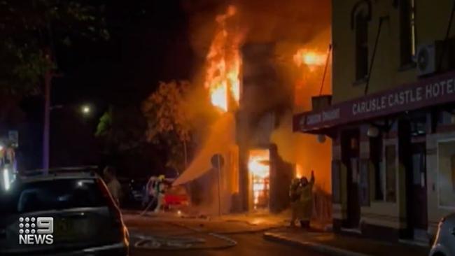 A fire broke out at the two-level boarding house in Newtown. Picture: 9 News