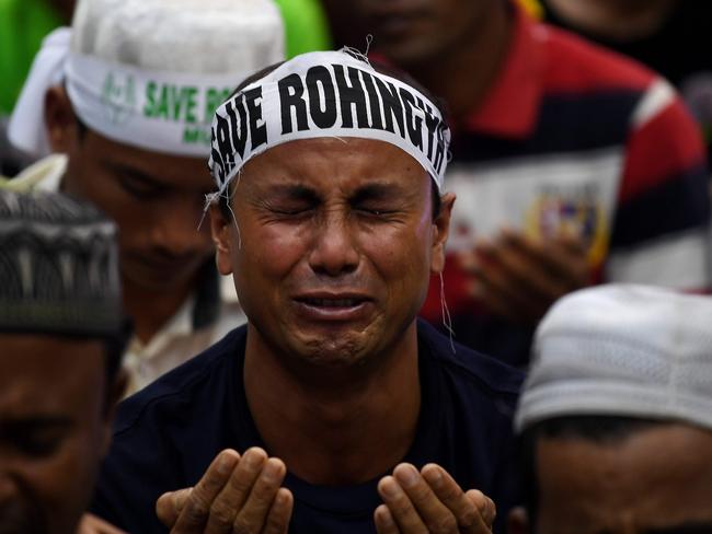 An ethnic Rohingya Muslim refugee breaks down during a gathering in Malaysia against the persecution of Rohingya Muslims in Myanmar. Picture: Manan Vatsyayana/AFP