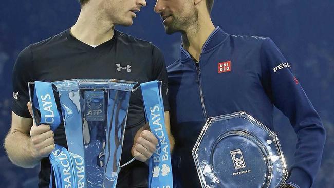 Andy Murray of Britain (left) speaks to Novak Djokovic of Serbia after winning the ATP World Tour Finals. Picture: Alastair Grant