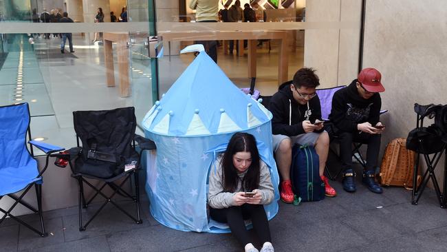 Young customers queue outside of the Sydney CDB Apple Store for the iPhone 7 last week. Picture: Paul Miller/AAP