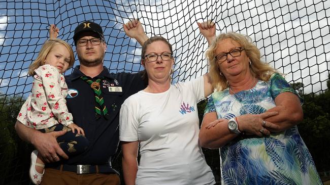 David Ballard with daughter Hailey, Lisa Radford and Cath Pezzimenti inside the Croydon Athletics Track cage. Picture: Hamish Blair