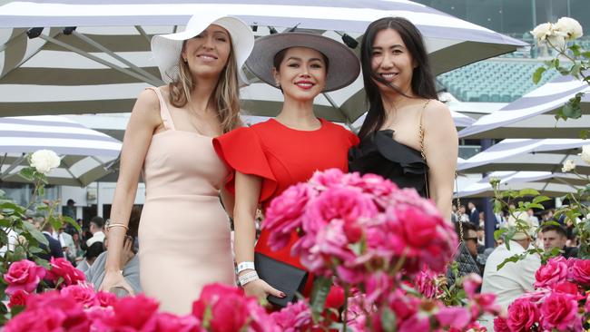 Kathryn, Yue and Alice at the TAB Champion Stakes Day at Flemington Racecourse in Melbourne. Picture: NCA NewsWire / David Crosling