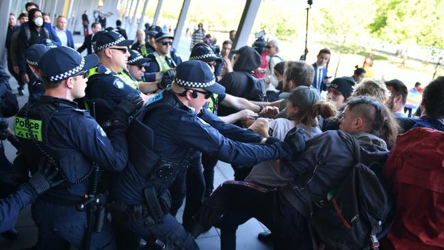 Protesters clashed with riot police in an ugly start to this morning’s IMARC protests at the Melbourne Convention and Exhibition Centre. Picture: Jake Nowakowski