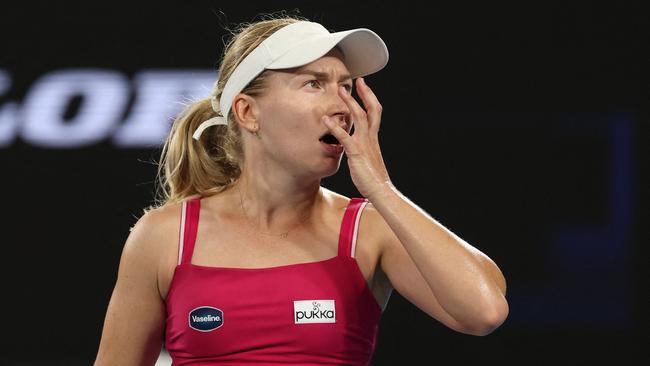 Australia's Daria Saville reacts after a point against Russia's Anna Blinkova during their women's singles match on day one of the Australian Open tennis tournament in Melbourne on January 12, 2025. (Photo by DAVID GRAY / AFP) / -- IMAGE RESTRICTED TO EDITORIAL USE - STRICTLY NO COMMERCIAL USE --